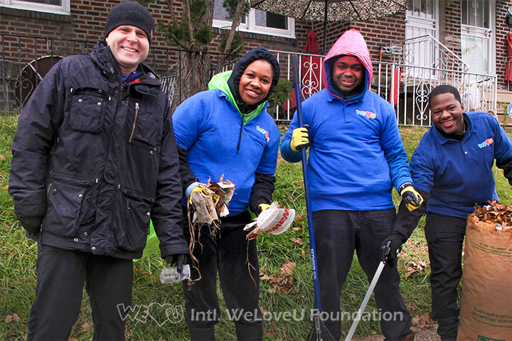 Rep Solomon with WeLoveU volunteers picking up trash