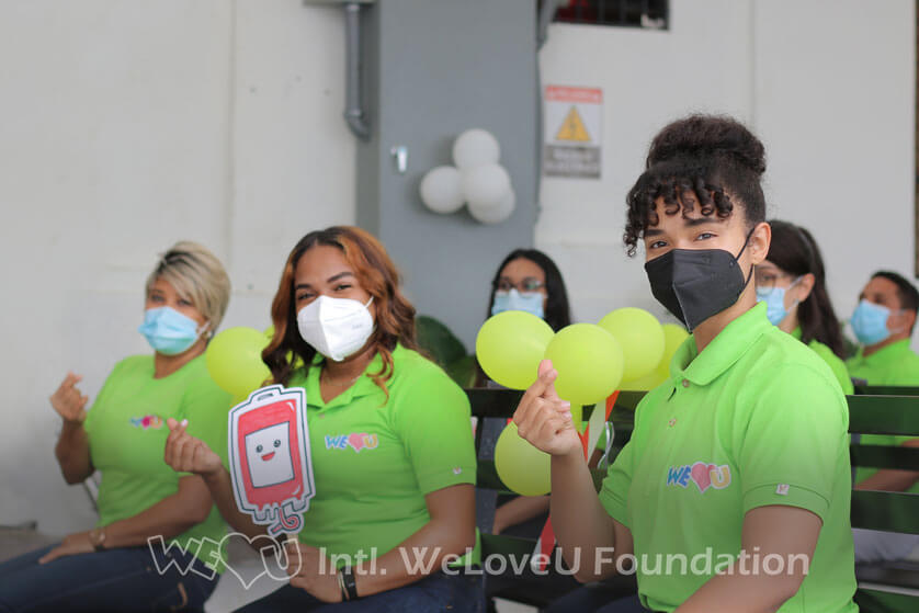 Volunteers smile at WeLoveU's blood drive in the Dominican Republic