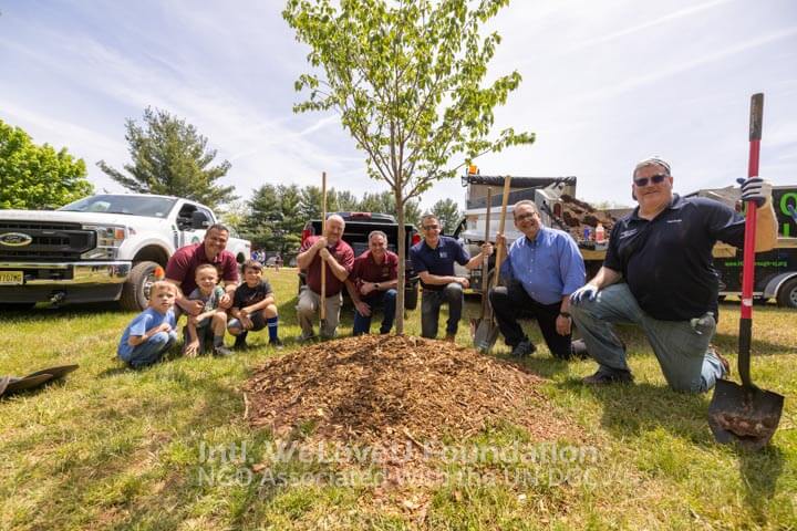 Hillsborough officials and Senator Zwicker planting a tree in Flagtown Park