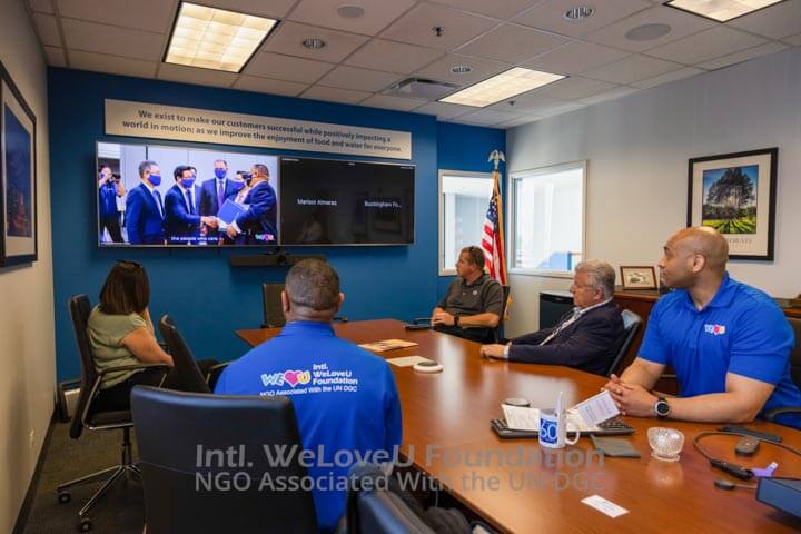 Antunes representatives watching a WeLoveU video
