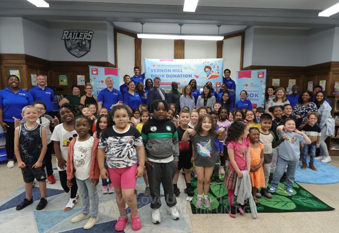 A group photo with Vernon Hill Elementary students