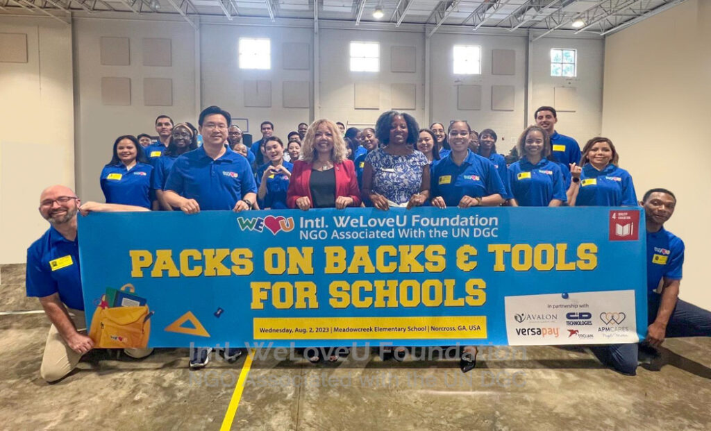 A group photo at Meadowcreek Elementary School of WeLoveU volunteers